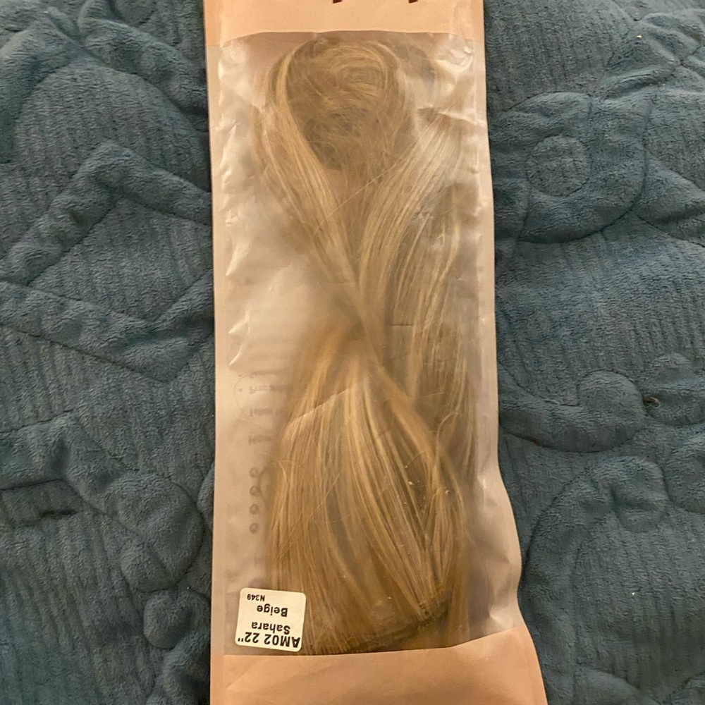 Sleek Blonde Hair Extension